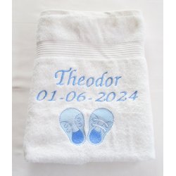 Hvidt Badehndklde med sko.