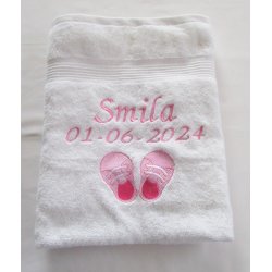 Hvidt Badehndklde med sko.