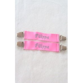 Pink vanteholder med navn.