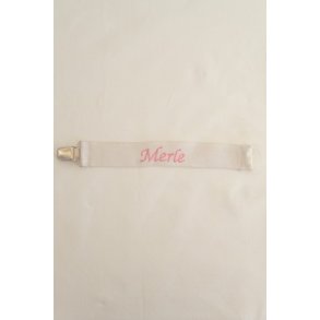 Hvid sutteholder med navn.