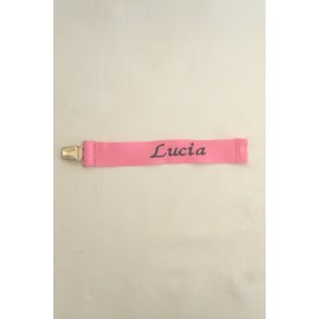 Pink sutteholder med navn.