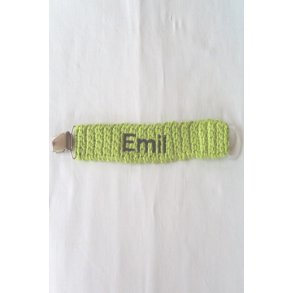 Limegr�n sutteholder med navn.